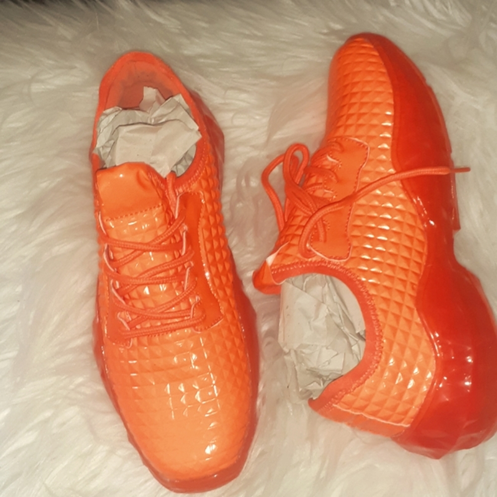 Liliana Neon orange casual sneakers.
